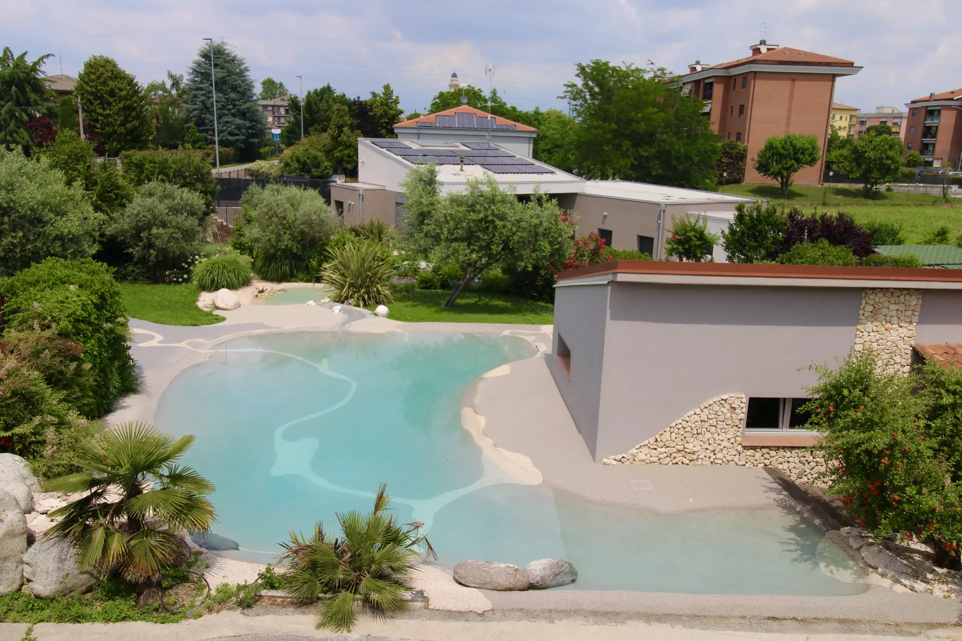 Naturi hand-troweled beach entry sand pool